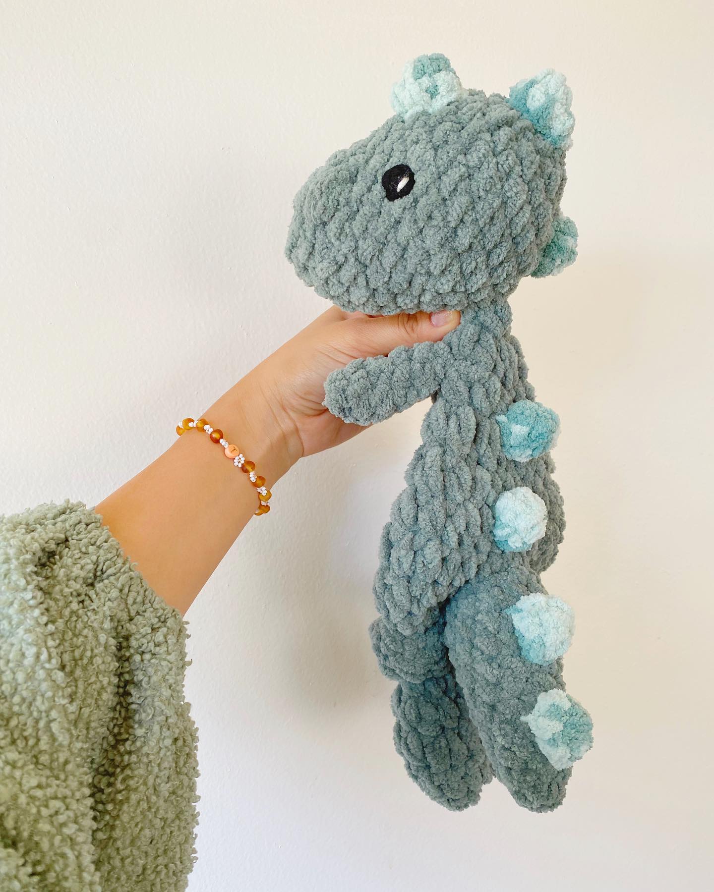 when your snuggler goes with your outfit 🦖🌴